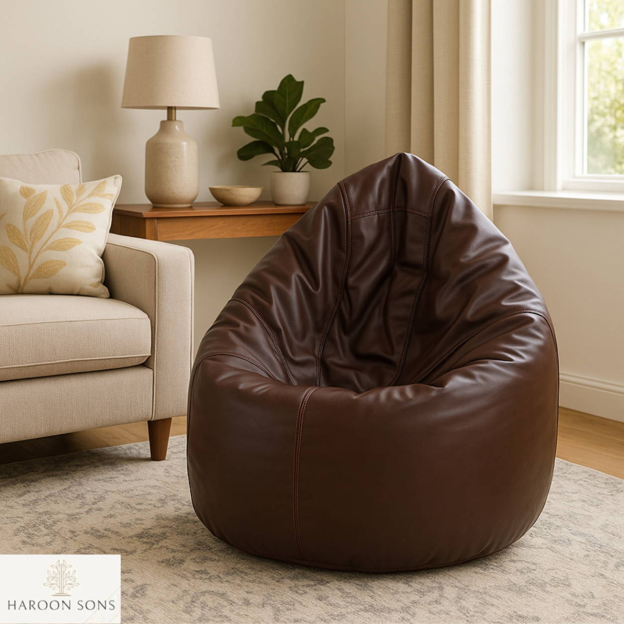 Brown bean bag chair in a living room setting with a lamp, plant, and sofa.